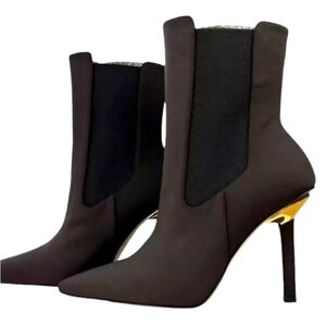 Good American Black Heeled Boots with Gold Accent